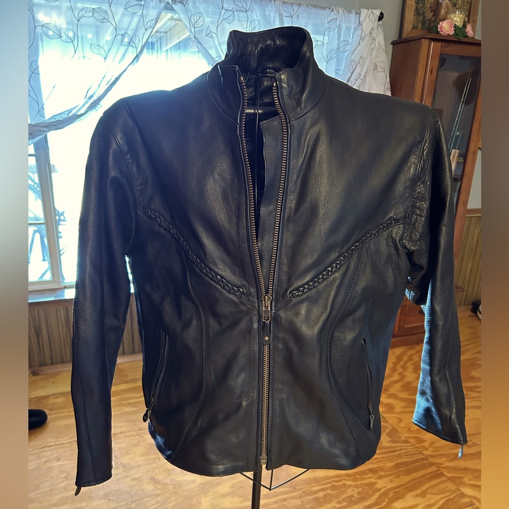 Leather Biker style ladies jacket with detachable liner.